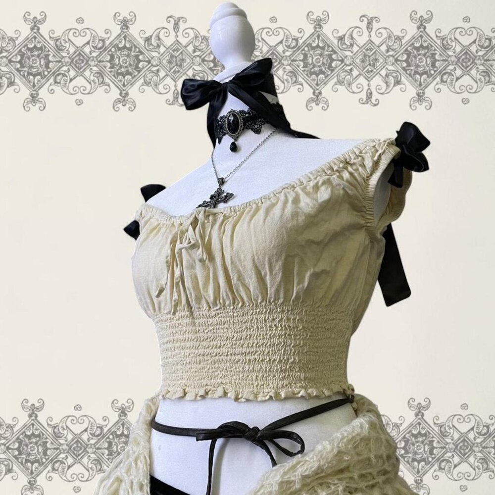 Cream crop top with black ribbons, stretchy and comfortable